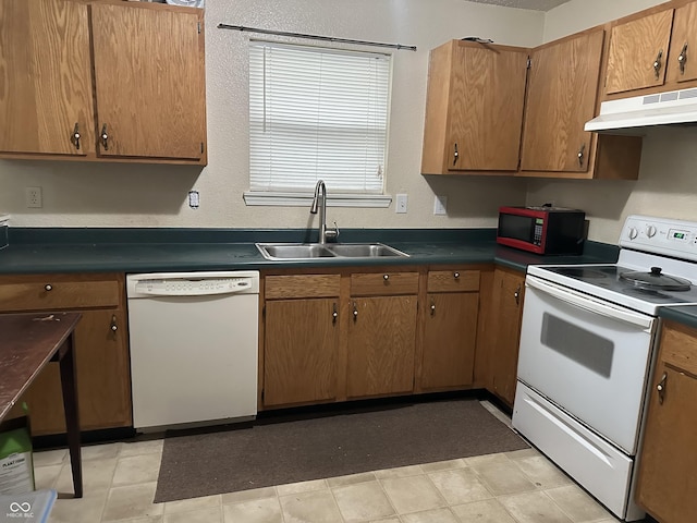 kitchen with sink and white appliances