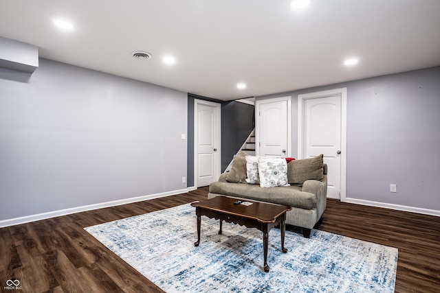 sitting room with dark hardwood / wood-style flooring