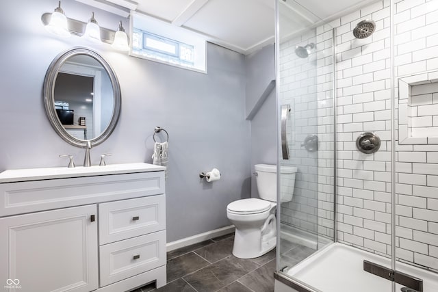 bathroom with vanity, toilet, and a shower with door