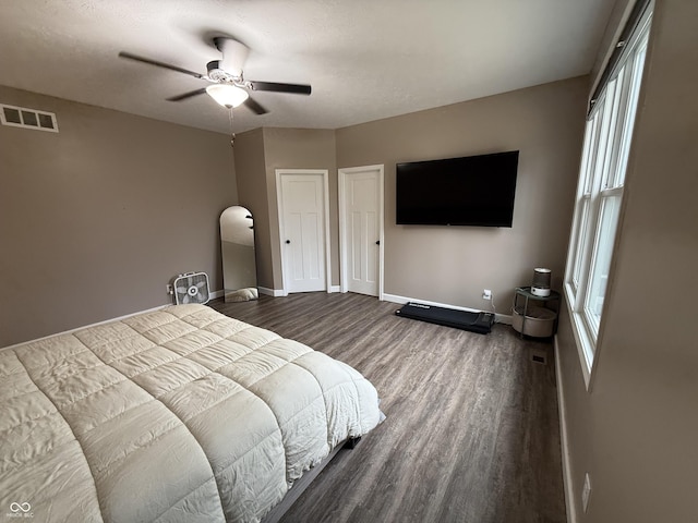 bedroom featuring hardwood / wood-style flooring and ceiling fan