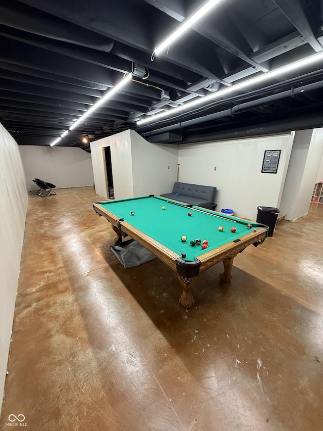 rec room with billiards and concrete floors