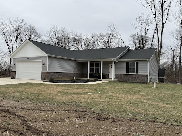 ranch-style home featuring a garage and a front lawn