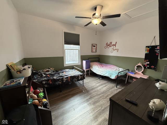 bedroom featuring ceiling fan and light wood-type flooring