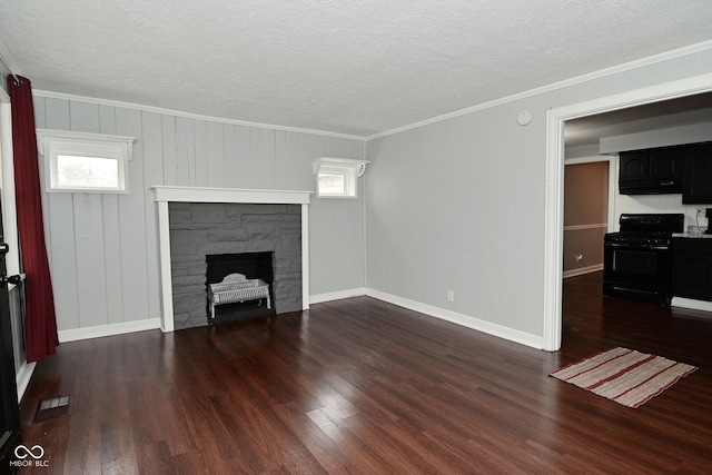 unfurnished living room featuring dark hardwood / wood-style flooring, a fireplace, and plenty of natural light