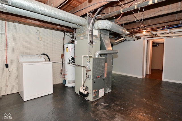 basement with washer / dryer, heating unit, and gas water heater