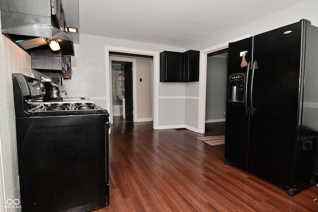 kitchen with dark wood-type flooring and black appliances