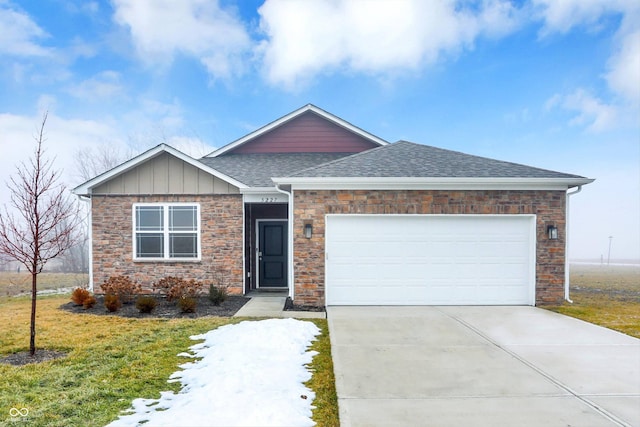 view of front of home with a garage and a front yard