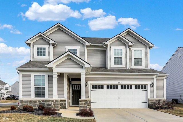 craftsman-style home featuring a garage