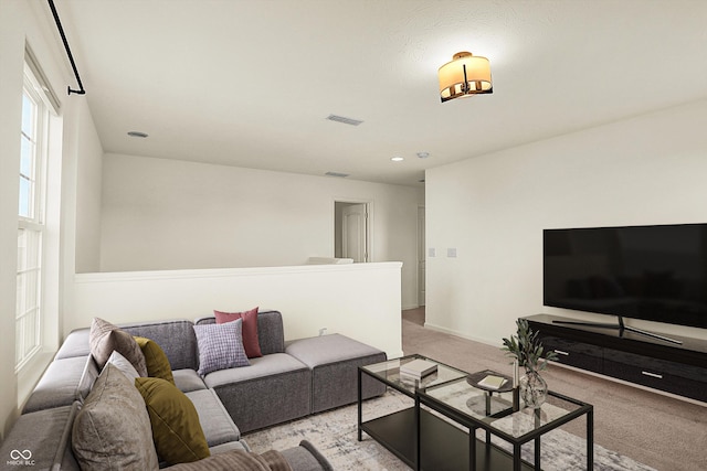 living room with light colored carpet