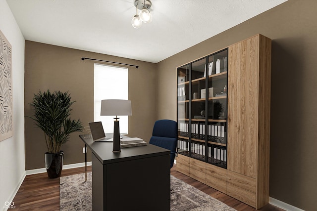 home office featuring dark hardwood / wood-style flooring