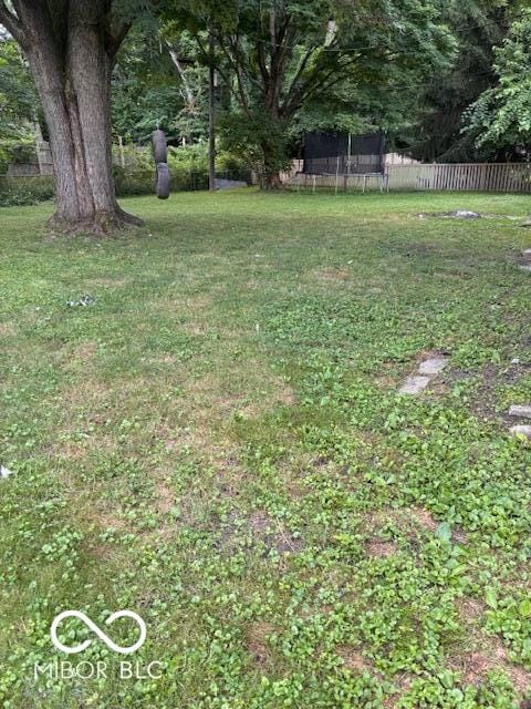 79 Circle Dr, Mooresville, IN 46158 - view of yard featuring a trampoline