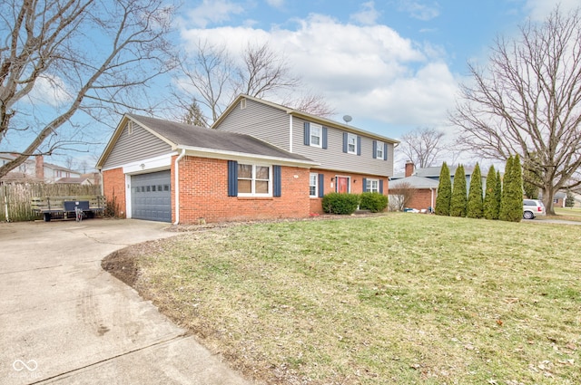 view of front of home featuring a garage and a front lawn