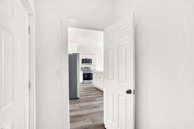 hall featuring light hardwood / wood-style floors