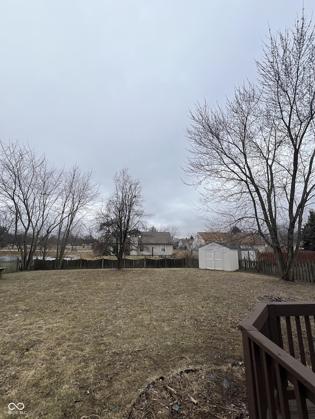 view of yard with a storage shed