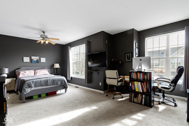 2231 Colfax Ln, Indianapolis, IN 46260 - bedroom with a desk, baseboards, and carpet floors