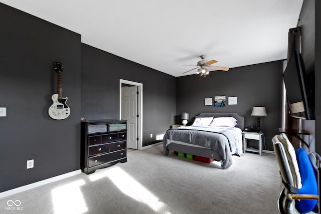 2231 Colfax Ln, Indianapolis, IN 46260 - bedroom with carpet floors, baseboards, and ceiling fan