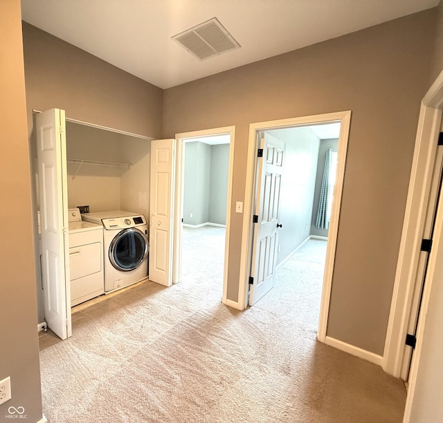 2231 Colfax Ln, Indianapolis, IN 46260 - washroom with separate washer and dryer and light carpet