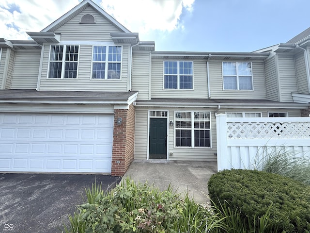 2231 Colfax Ln, Indianapolis, IN 46260 - view of front of home with driveway and a garage