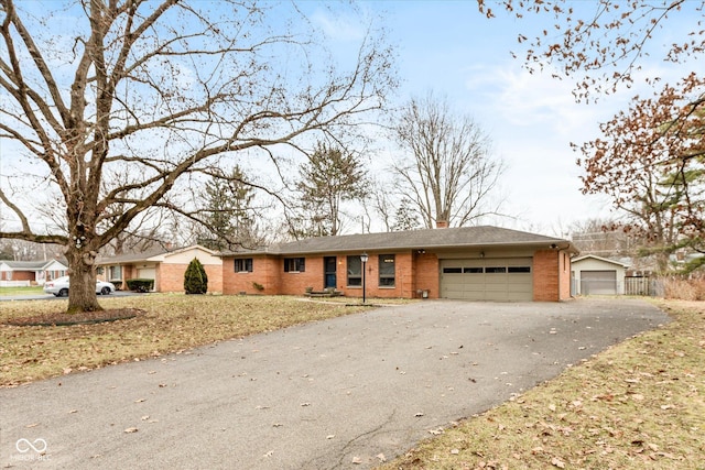 single story home featuring a garage