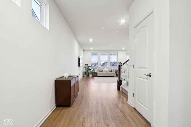 corridor featuring light hardwood / wood-style flooring