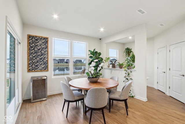 dining room featuring light hardwood / wood-style flooring