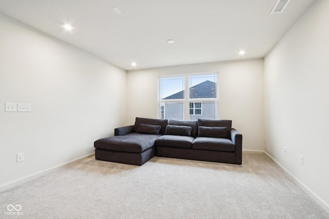 living room with light colored carpet