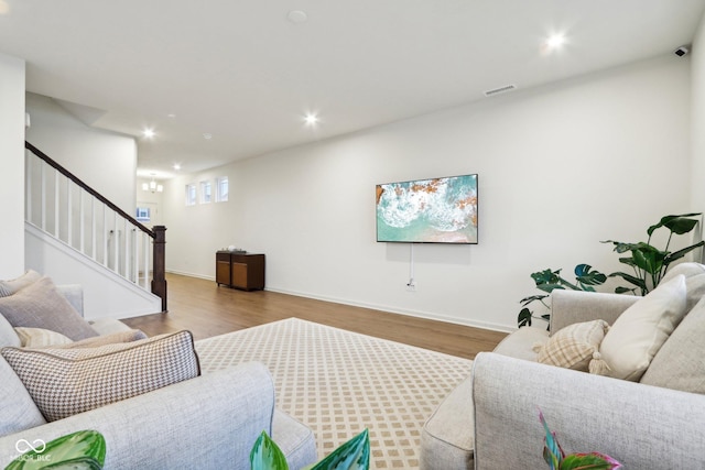 living room with light hardwood / wood-style flooring