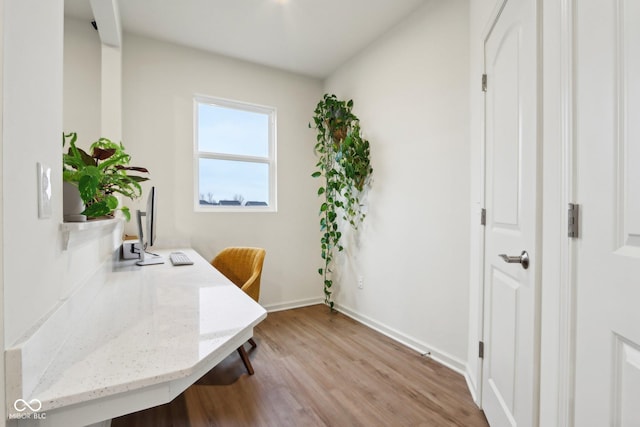 office area with light wood-type flooring