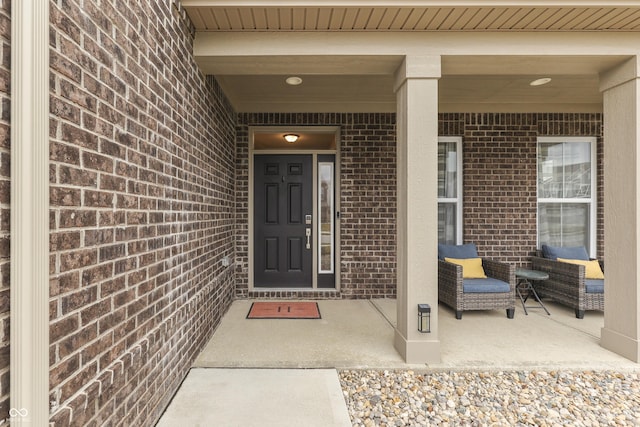 property entrance featuring covered porch