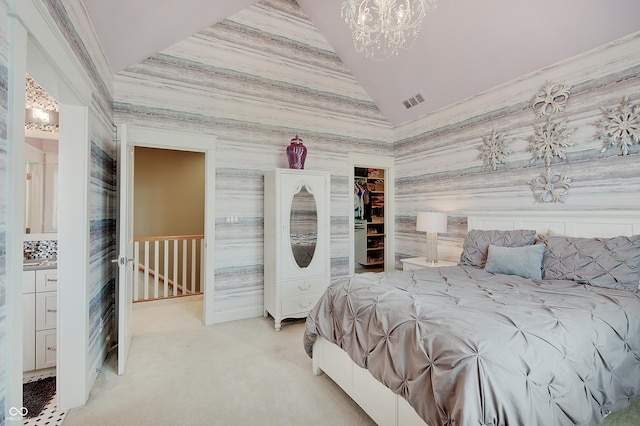 14445 Gainesway Cir, Fishers, IN 46040 - bedroom featuring a chandelier, light carpet, wallpapered walls, a walk in closet, and a closet