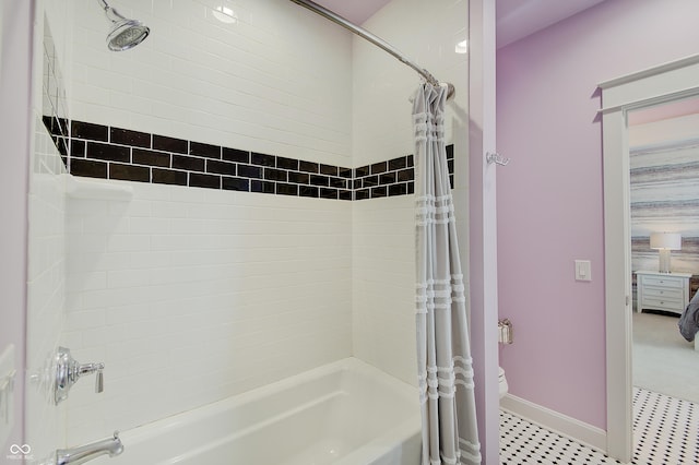 14445 Gainesway Cir, Fishers, IN 46040 - bathroom with shower / tub combo with curtain and toilet