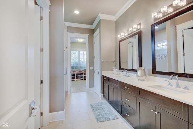 14445 Gainesway Cir, Fishers, IN 46040 - full bath featuring double vanity, ornamental molding, and tile patterned flooring