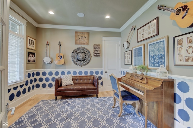 14445 Gainesway Cir, Fishers, IN 46040 - living area with wood finished floors, wainscoting, plenty of natural light, ornamental molding, and recessed lighting