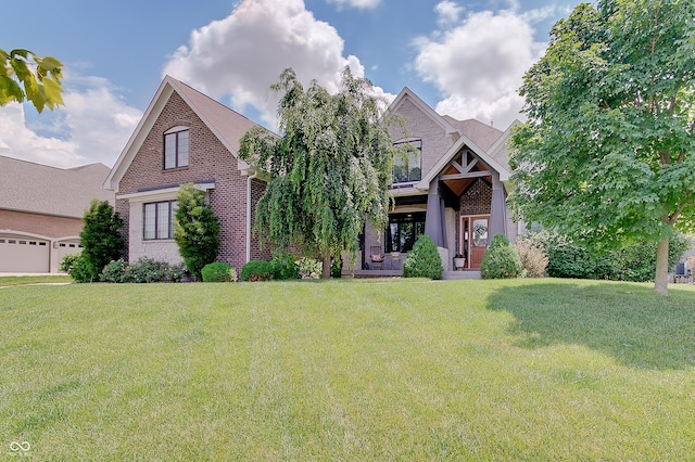 14445 Gainesway Cir, Fishers, IN 46040 - craftsman-style house with brick siding and a front yard