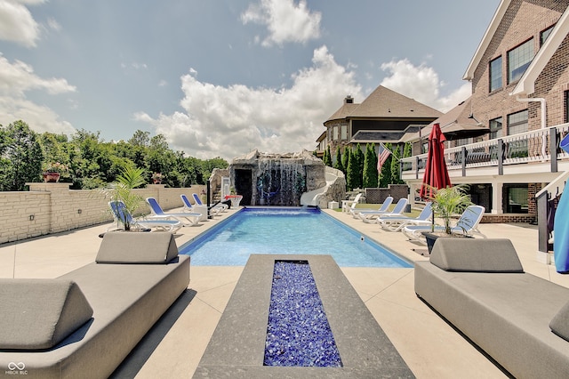 14445 Gainesway Cir, Fishers, IN 46040 - view of swimming pool with a water slide and a patio area
