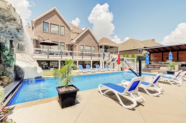 14445 Gainesway Cir, Fishers, IN 46040 - community pool with stairway, a sunroom, a patio area, and a wooden deck
