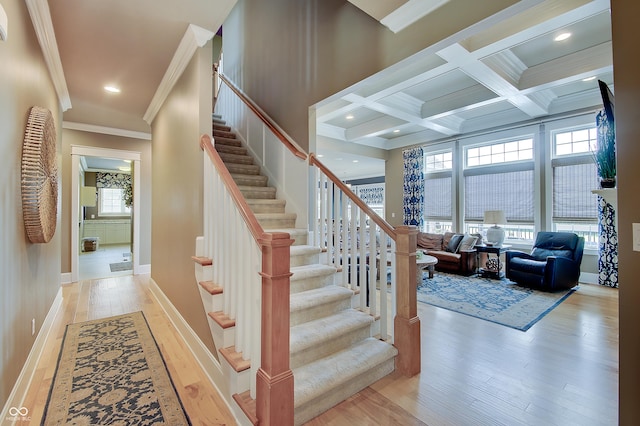 14445 Gainesway Cir, Fishers, IN 46040 - staircase featuring crown molding, wood finished floors, beamed ceiling, recessed lighting, and coffered ceiling