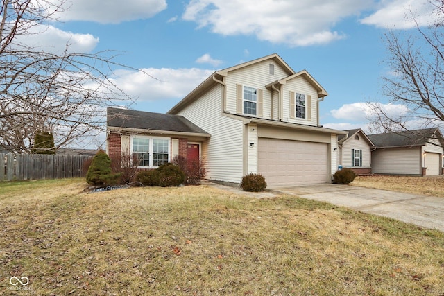 front of property featuring a garage and a front lawn