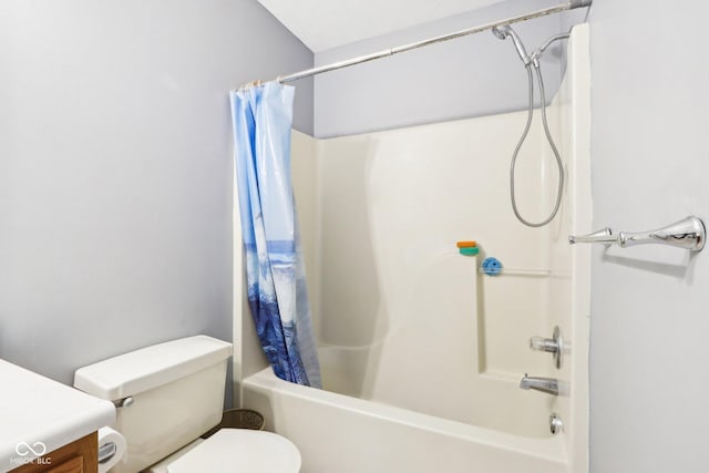 full bathroom with vanity, toilet, and shower / bath combo with shower curtain