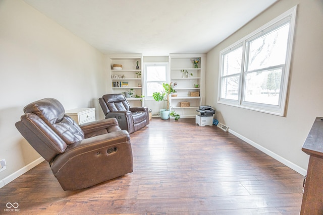 living area featuring hardwood / wood-style flooring