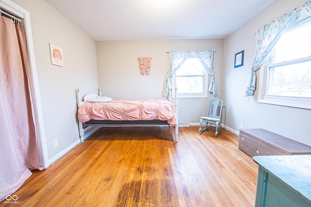 bedroom featuring light hardwood / wood-style flooring