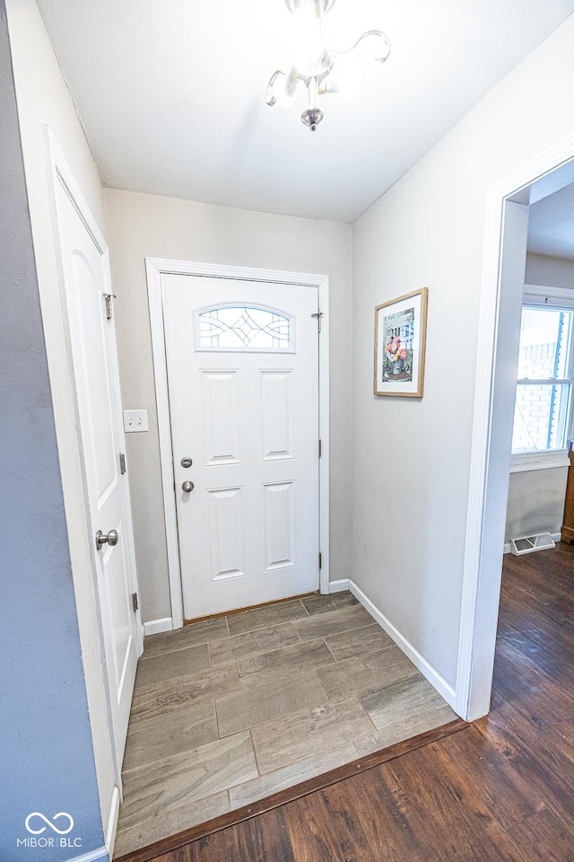 foyer featuring dark hardwood / wood-style flooring