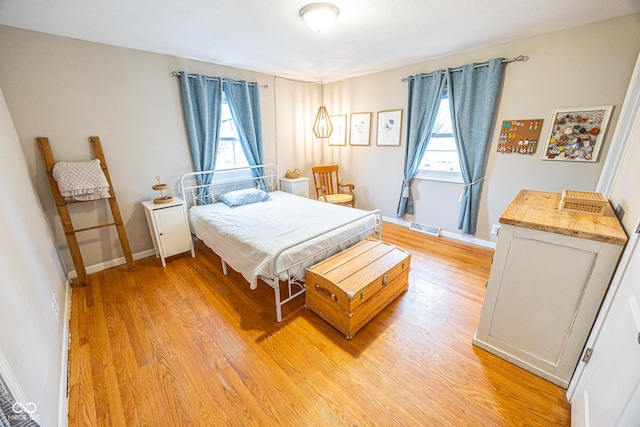 bedroom featuring light hardwood / wood-style flooring