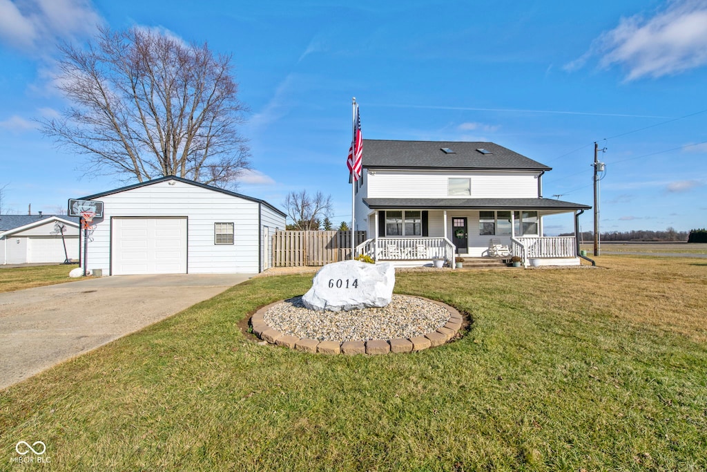 view of front of home featuring a front yard and a porch