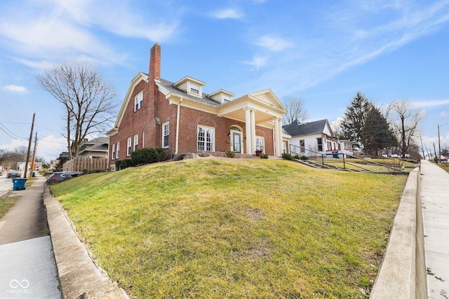 view of front of home with a front yard