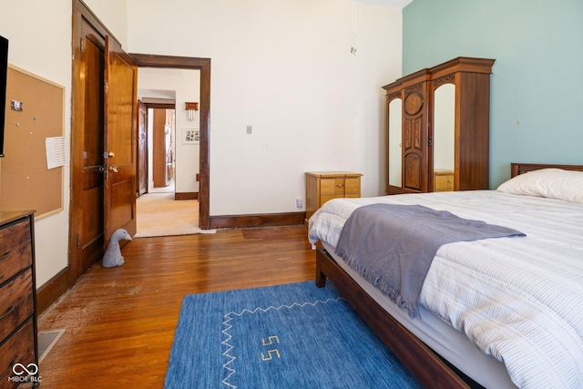 bedroom featuring dark hardwood / wood-style floors