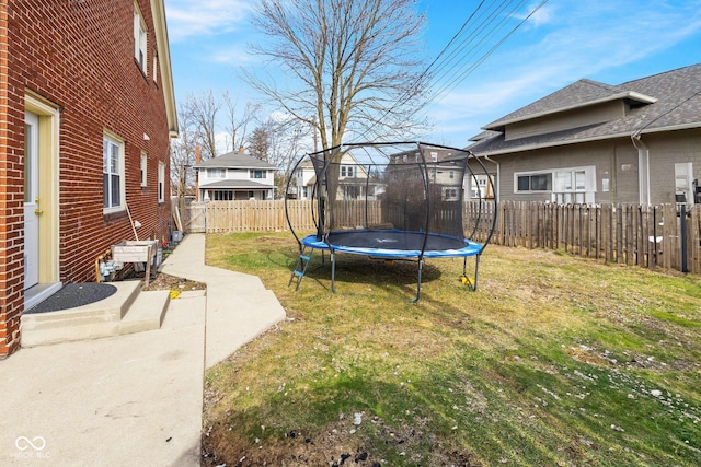 view of yard featuring a trampoline