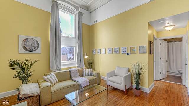 living room with light hardwood / wood-style flooring