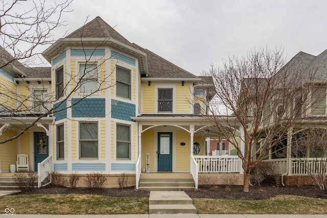 victorian-style house with covered porch