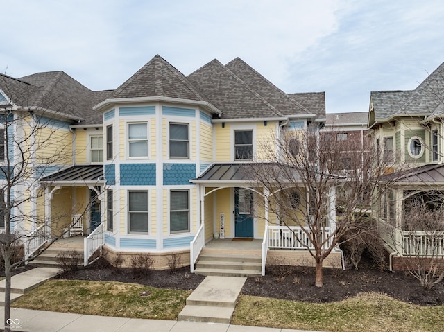 victorian home featuring a porch